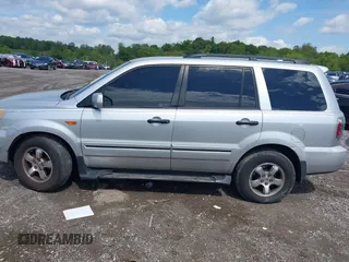 2006 Honda Pilot EX-L with VIN 2HKYF18596H563583, listed as a IAAI auction lot 42183326 with 181,665 mi miles and . Bid and sale history available at DreamBid. Image 14.