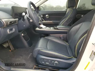 2023 Genesis GV60 Performance z VIN KMUKEDTB6PU005508, wystawiony jako Copart lot #49612945 z przebiegiem 24 354 mil mil oraz Szkody całkowita. Historia ofert i sprzedaży dostępna na DreamBid. Obrazek 7.