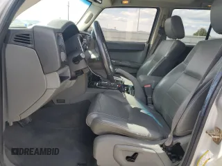 2006 Jeep Commander with VIN 1J8HG48K86C297269, listed as a Copart auction lot 52232465 with 158,623 mi miles and Salvage Title. Bid and sale history available at carsss.com. Image 7.