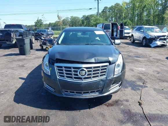 2014 Cadillac XTS Luxury z VIN 2G61M5S37E9211547, wystawiony jako IAAI lot #42373128 z przebiegiem 146 354 mil mil oraz . Historia ofert i sprzedaży dostępna na DreamBid. Obrazek 12.