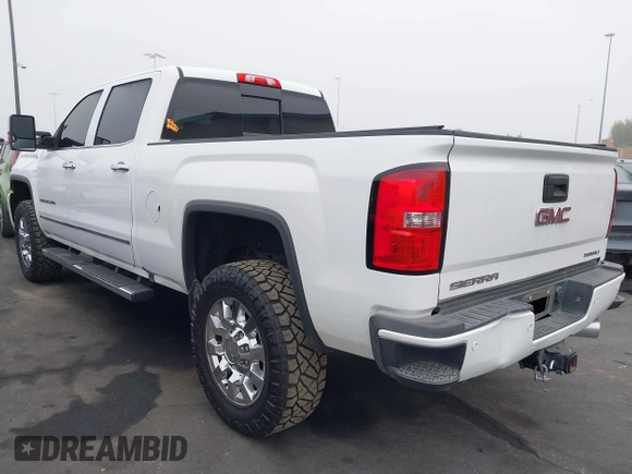 2015 GMC Sierra 2500HD Denali with VIN 1GT120E85FF681680, listed as a IAAI auction lot 42081711 with 67,676 mi miles and . Bid and sale history available at DreamBid. Image 3.