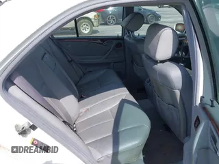 2002 Mercedes-Benz E-Class with VIN WDBJF65J22B432263, listed as a IAAI auction lot 42130545 with 220,852 mi miles. Bid and sale history available at carsss.com. Image 8.