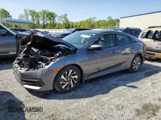 2018 Honda Civic EX with VIN 19XFC2F76JE027598, listed as a Copart auction lot 52301385 with 128,854 mi miles and Salvage Title. Bid and sale history available at DreamBid. Image 1.