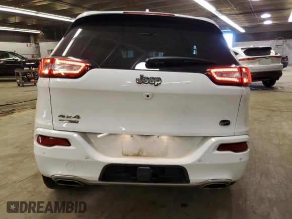 2018 Jeep Cherokee Overland with VIN 1C4PJMJX5JD558242, listed as a Copart auction lot 77577254 with 55,440 mi miles and Salvage Title. Bid and sale history available at carsss.com. Image 6.