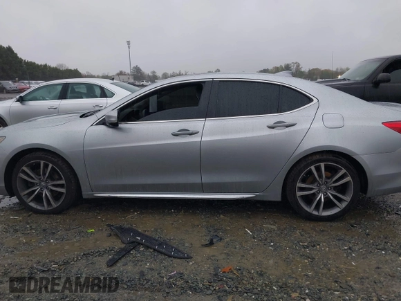 2019 Acura TLX Technology with VIN 19UUB2F42KA007788, listed as a IAAI auction lot 41970877 with 104,356 mi miles and . Bid and sale history available at DreamBid. Image 14.