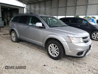 2017 Dodge Journey SXT z VIN 3C4PDDBG4HT578315, wystawiony jako Copart lot #57402405 z przebiegiem 136 404 mil mil oraz Czysty tytuł • Clean title. Historia ofert i sprzedaży dostępna na DreamBid. Obrazek 4.
