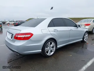 2013 Mercedes-Benz E-Class E 350 Luxury with VIN WDDHF8JB1DA720607, listed as a IAAI auction lot 41514018 with 135,926 mi miles. Bid and sale history available at carsss.com. Image 4.