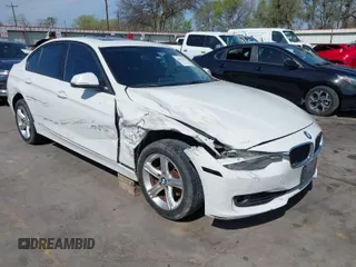 2014 BMW 3 Series 328i with VIN WBA3C1C52EK111076, listed as a IAAI auction lot 41817471 with 98,759 mi miles. Bid and sale history available at carsss.com. Image 1.