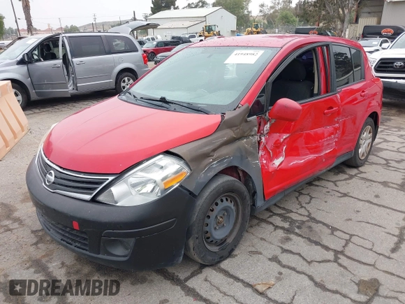 2012 Nissan Versa S with VIN 3N1BC1CP2CL369757, listed as a IAAI auction lot 41948982 with 219,466 mi miles. Bid and sale history available at carsss.com. Image 2.
