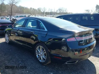 2016 Lincoln MKZ z VIN 3LN6L2G92GR612255, wystawiony jako IAAI lot #41647296 z przebiegiem 130 996 mil mil oraz . Historia ofert i sprzedaży dostępna na DreamBid. Obrazek 14.