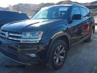 2019 Volkswagen Atlas SE with VIN 1V2LR2CAXKC566024, listed as a IAAI auction lot 41296531 with 106,175 mi miles and . Bid and sale history available at DreamBid. Image 2.