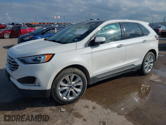 2020 Ford Edge Titanium z VIN 2FMPK3K98LBA42159, wystawiony jako IAAI lot #42358229 z przebiegiem 88 512 mil mil oraz . Historia ofert i sprzedaży dostępna na DreamBid. Obrazek 2.