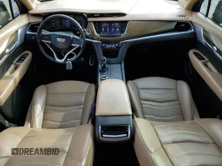2020 Cadillac XT6 AWD Sport z VIN 1GYKPHRS1LZ209619, wystawiony jako Copart lot #43461425 z przebiegiem 65 321 mil mil oraz Szkody całkowita. Historia ofert i sprzedaży dostępna na DreamBid. Obrazek 8.