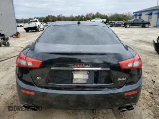 2015 Maserati Ghibli S Q4 with VIN ZAM57RTA8F1144369, listed as a Copart auction lot 77810033 with 82,749 mi miles. Bid and sale history available at carsss.com. Image 6.