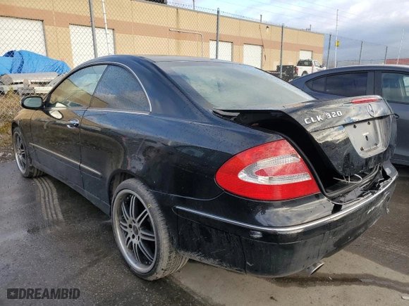 2003 Mercedes-Benz CLK-Class 3.2L with VIN WDBTJ65J63F034541, listed as a Copart auction lot 80896884 with 192,984 mi miles and Salvage Title. Bid and sale history available at carsss.com. Image 2.