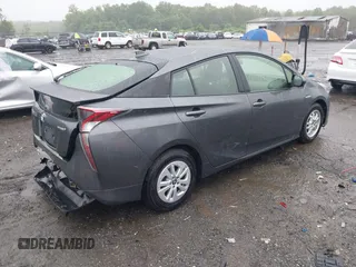 2016 Toyota Prius Two z VIN JTDKBRFU7G3000989, wystawiony jako IAAI lot #42345088 z przebiegiem 117 427 mil mil oraz . Historia ofert i sprzedaży dostępna na DreamBid. Obrazek 4.