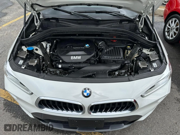 2018 BMW X2 sDrive28i z VIN WBXYJ3C32JEJ75882, wystawiony jako Copart lot #56330835 z przebiegiem 84 609 mil mil oraz Tytuł czysty. Historia ofert i sprzedaży dostępna na DreamBid. Obrazek 6.