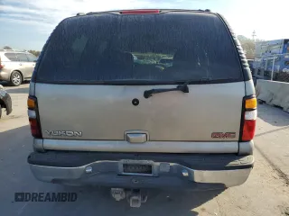 2000 GMC Yukon SLE with VIN 1GKEK13T2YJ130870, listed as a Copart auction lot 82887054 with 310,765 mi miles and Salvage Title. Bid and sale history available at carsss.com. Image 6.