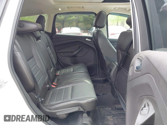 2016 Ford Escape Titanium with VIN 1FMCU9J98GUA00832, listed as a IAAI auction lot 42188941 with 90,764 mi miles and . Bid and sale history available at DreamBid. Image 8.