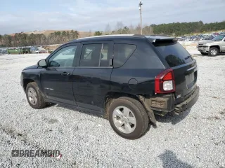 2016 Jeep Compass 75th Anniversary with VIN 1C4NJCBB2GD716887, listed as a Copart auction lot 47291555 with 148,943 mi miles and Salvage Title. Bid and sale history available at carsss.com. Image 2.