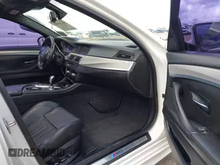2013 BMW M5 with VIN WBSFV9C56DC772961, listed as a IAAI auction lot 41765457 with 104,568 mi miles. Bid and sale history available at carsss.com. Image 5.