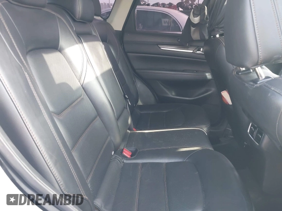 2020 Mazda CX-5 Grand Touring with VIN JM3KFADM5L0739306, listed as a IAAI auction lot 42215667 with 126,100 mi miles and . Bid and sale history available at DreamBid. Image 8.