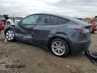 2024 Tesla Model Y Long Range z VIN 7SAYGDEE3RF087162, wystawiony jako Copart lot #79315224 z przebiegiem 3 232 mil mil oraz Szkoda całkowita • Salvage title. Historia ofert i sprzedaży dostępna na DreamBid. Obrazek 2.