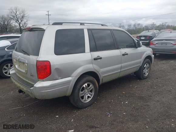 2003 Honda Pilot EX with VIN 2HKYF18533H604995, listed as a IAAI auction lot 41936058 with 205,848 mi miles. Bid and sale history available at carsss.com. Image 4.