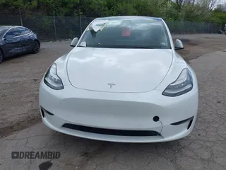 2022 Tesla Model Y Long Range z VIN 7SAYGDEE7NF385207, wystawiony jako IAAI lot #42054449 z przebiegiem 52 834 mil mil oraz . Historia ofert i sprzedaży dostępna na DreamBid. Obrazek 12.