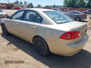 2008 Kia Optima LX z VIN KNAGE123085250587, wystawiony jako IAAI lot #42171570 z przebiegiem 223 838 mil mil oraz . Historia ofert i sprzedaży dostępna na DreamBid. Obrazek 3.