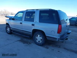 1996 Chevrolet Tahoe with VIN 1GNEK13R3TJ318572, listed as a IAAI auction lot 41419555 with 199,201 mi miles. Bid and sale history available at carsss.com. Image 3.