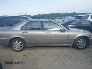 2002 Acura RL с VIN JH4KA965X2C012055, выставлен на аукционе IAAI как лот 42273551 с пробегом 148 392 миль миль и . История ставок и продаж доступна на DreamBid. Изображение 13.