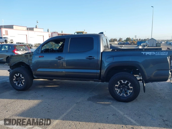2022 Toyota Tacoma SR z VIN 3TMCZ5AN1NM531884, wystawiony jako IAAI lot #42257444 z przebiegiem Nie podano mil oraz . Historia ofert i sprzedaży dostępna na DreamBid. Obrazek 14.