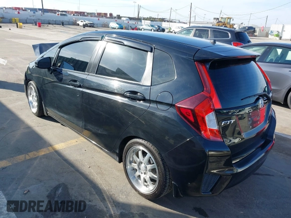 2015 Honda Fit LX z VIN 3HGGK5H57FM717203, wystawiony jako IAAI lot #41615075 z przebiegiem 99 933 mil mil oraz . Historia ofert i sprzedaży dostępna na DreamBid. Obrazek 3.