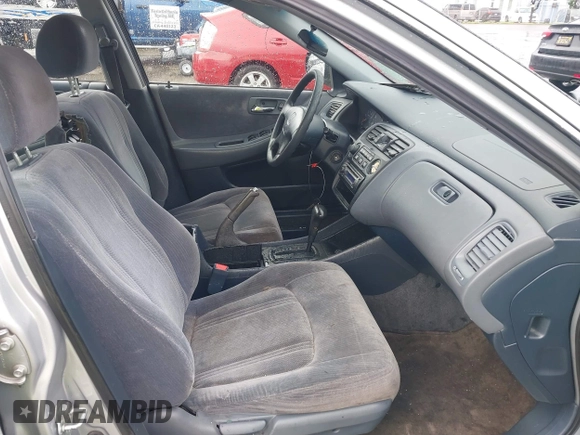 1999 Honda Accord LX z VIN 1HGCG5645XA023392, wystawiony jako IAAI lot #41525751 z przebiegiem 214 850 mil mil oraz . Historia ofert i sprzedaży dostępna na DreamBid. Obrazek 5.