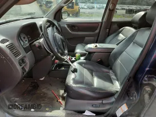 2003 Ford Escape XLT Popular with VIN 1FMCU03123KA03878, listed as a Copart auction lot 60133485 with 298,100 mi miles and Salvage title. Bid and sale history available at DreamBid. Image 7.