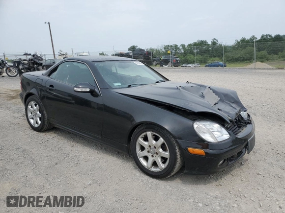 2002 Mercedes-Benz SLK 320 with VIN WDBKK65FX2F237273, listed as a Copart auction lot 61068345 with 193,304 mi miles and Salvage title. Bid and sale history available at DreamBid. Image 4.