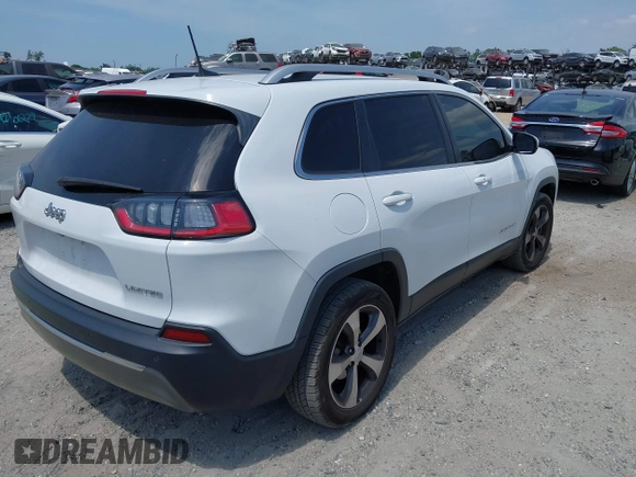 2019 Jeep Cherokee Limited with VIN 1C4PJLDB8KD402904, listed as a IAAI auction lot 42107306 with 96,677 mi miles and . Bid and sale history available at DreamBid. Image 4.