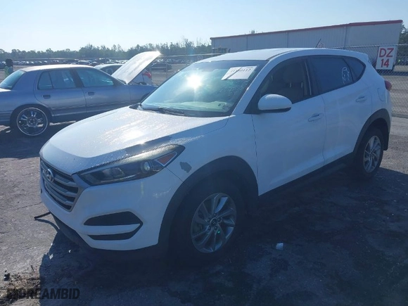 2018 Hyundai Tucson SE with VIN KM8J23A42JU627533, listed as a IAAI auction lot 41880112 with 61,840 mi miles. Bid and sale history available at carsss.com. Image 2.