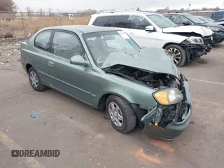 2003 Hyundai Accent GL z VIN KMHCG35C53U256981, wystawiony jako IAAI lot #41317375 z przebiegiem 73 522 mil mil oraz . Historia ofert i sprzedaży dostępna na DreamBid. Obrazek 1.