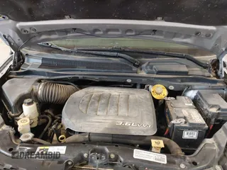 2014 Dodge Grand Caravan SXT with VIN 2C4RDGCG9ER213426, listed as a IAAI auction lot 41044553 with 175,140 mi miles and . Bid and sale history available at DreamBid. Image 10.