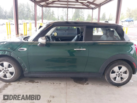2016 MINI Hardtop with VIN WMWXP5C52G3B15559, listed as a IAAI auction lot 42310617 with 100,358 mi miles and . Bid and sale history available at DreamBid. Image 14.