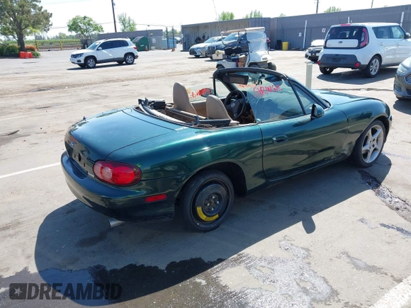 2001 Mazda MX-5 Miata with VIN JM1NB353410203981, listed as a IAAI auction lot 42028077 with Not Provided miles and . Bid and sale history available at DreamBid. Image 4.