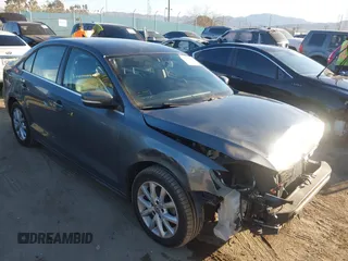 2014 Volkswagen Jetta SE z VIN 3VWD17AJ1EM285792, wystawiony jako IAAI lot #41652684 z przebiegiem 169 929 mil mil oraz . Historia ofert i sprzedaży dostępna na DreamBid. Obrazek 1.