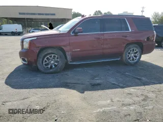 2017 GMC Yukon SLT with VIN 1GKS1BKC9HR362459, listed as a Copart auction lot 68303984 with 136,633 mi miles and Salvage Title. Bid and sale history available at carsss.com. Image 1.