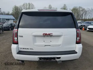2018 GMC Yukon XL SLT with VIN 1GKS2GKC8JR307890, listed as a Copart auction lot 54428945 with 65,590 mi miles and Salvage title. Bid and sale history available at DreamBid. Image 6.