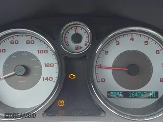2009 Pontiac G5 GT with VIN 1G2AT18H797147694, listed as a IAAI auction lot 41996093 with 164,747 mi miles. Bid and sale history available at carsss.com. Image 7.