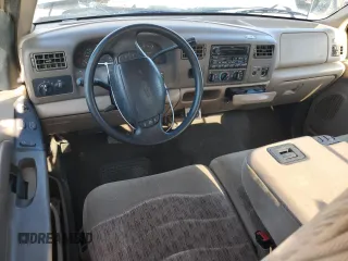 1999 Ford F-350 with VIN 1FTWX32F6XED54952, listed as a Copart auction lot 57676805 with 146,544 mi miles and Salvage title. Bid and sale history available at DreamBid. Image 8.