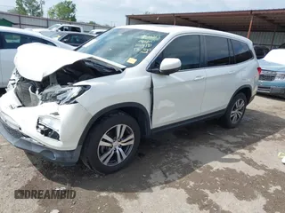 2017 Honda Pilot EX-L with VIN 5FNYF6H5XHB005000, listed as a IAAI auction lot 42039832 with 141,592 mi miles and . Bid and sale history available at DreamBid. Image 18.