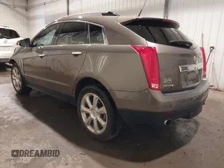 2014 Cadillac SRX Performance Collection z VIN 3GYFNFE38ES578066, wystawiony jako IAAI lot #42153023 z przebiegiem 134 009 mil mil oraz . Historia ofert i sprzedaży dostępna na DreamBid. Obrazek 3.